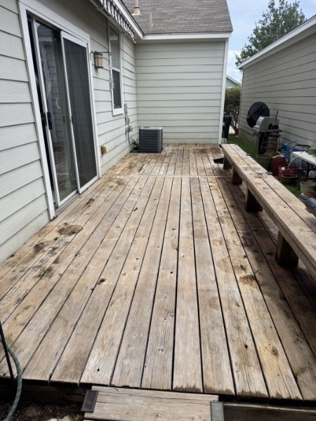 Weathered grey deck before refinishing